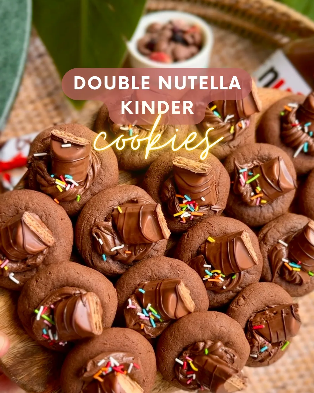 Mini Nutella cookies filled with Nutella and topped with chopped Kinder Bueno